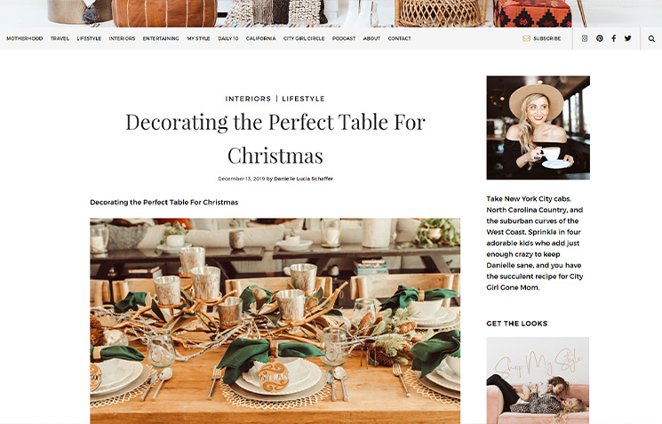 Blog article titled 'Decorating the Perfect Table For Christmas' with a festive holiday tablescape image