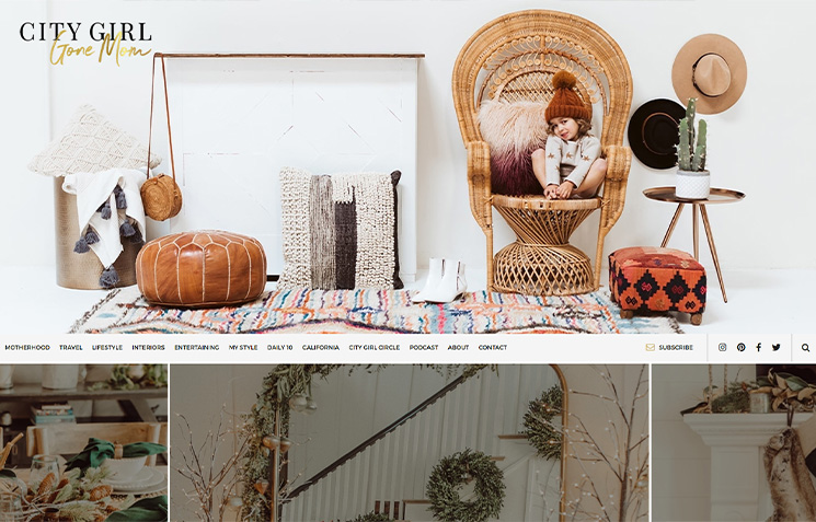 Homepage of a lifestyle blog featuring a child sitting on a decorative chair surrounded by cozy home decor