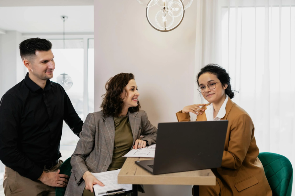 Three coworkers meeting and working together